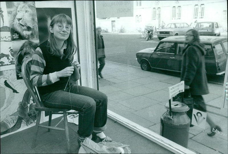 Jenny Berill of Scolex 13 receives a generous food donation from TM Big But Laint Mean Mea Woljim 008. - Vintage Photograph