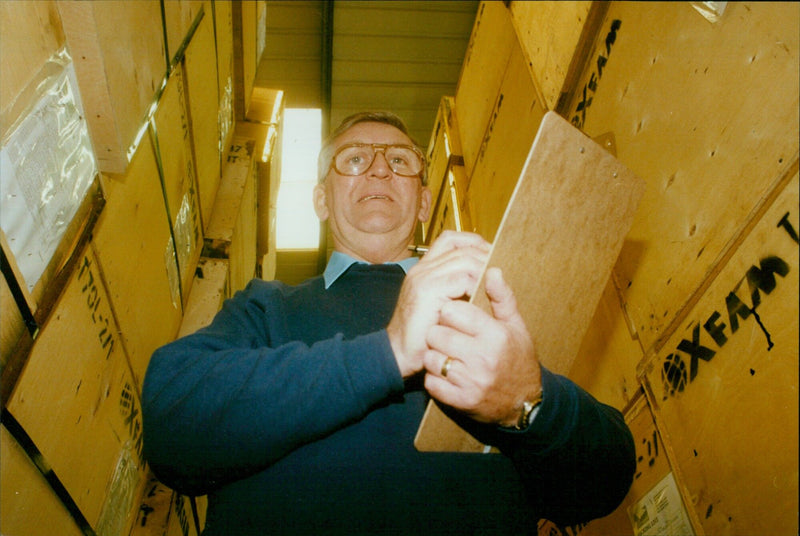 Oxfam emergency warehouse in Bicester filled with 2.5 million pounds worth of water purification equipment. - Vintage Photograph