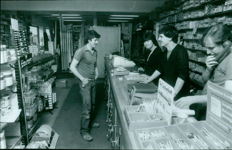 Employees celebrate the 60th anniversary of Powell's DIY Shop. - Vintage Photograph