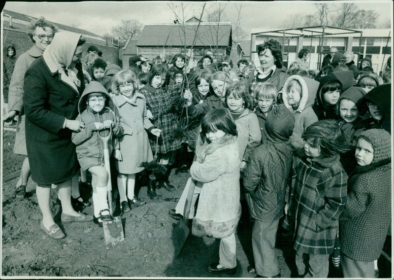 Pupils at St Andrew's Primary School in Headington prepare to help plant 12 silver birches in a new adventure playground and nature reserve. - Vintage Photograph