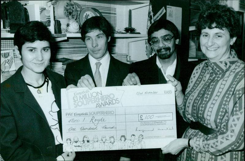 Three "Souper Heroes" receive £1 million award from Campbell's Soup on behalf of Oxfam. - Vintage Photograph