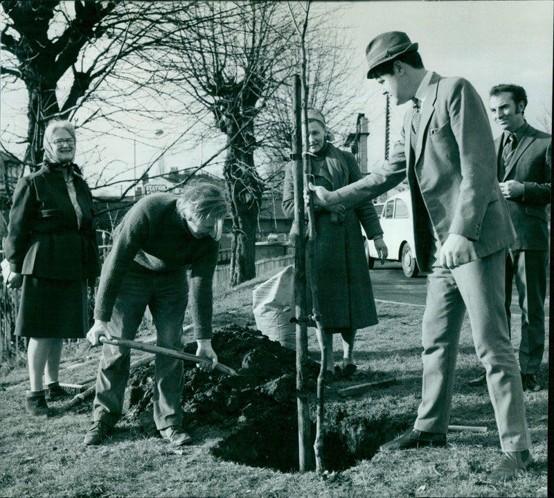 C. Wood and V. Berry of the Oxford Civic Society planting a plane tree outside of Oxford Station. - Vintage Photograph