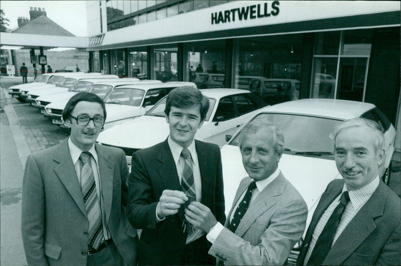 Hartwells' Phil Ponting presents car keys to Trevor Lathey, Phil Ponting and Harry Turnbull. - Vintage Photograph