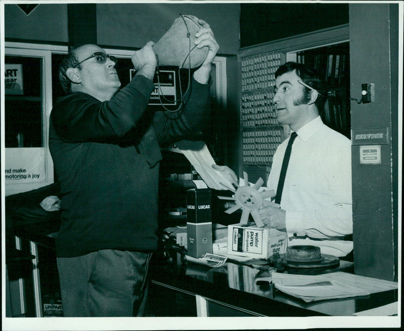 Unipart and Lucas Service Parts with gasket water pump being assembled at Barclaycard Service Centre. - Vintage Photograph