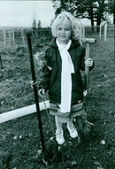 Tara Kozul plants an oak tree in South Park on Tree Day. - Vintage Photograph