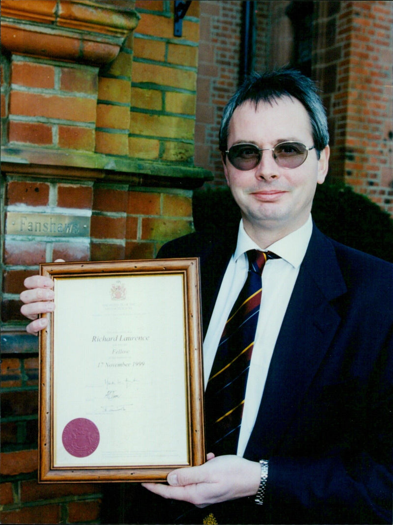 Richard Laurence, Group Aftersales Training Manager at Hartwell plc in Oxford, is elected a Fellow of the Institute of the Motor Industry. - Vintage Photograph