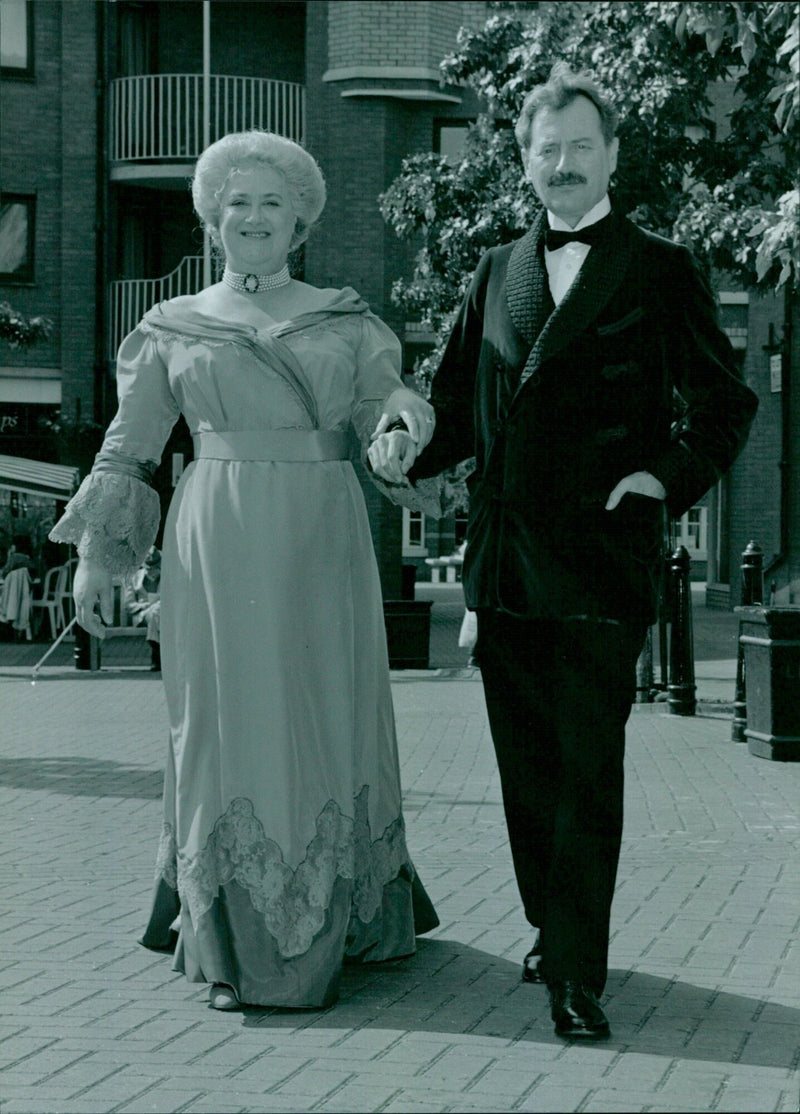 Peter Blythe and Gillian Martell attend a photo call for "The Voysey Inheritance" in Oxford. - Vintage Photograph