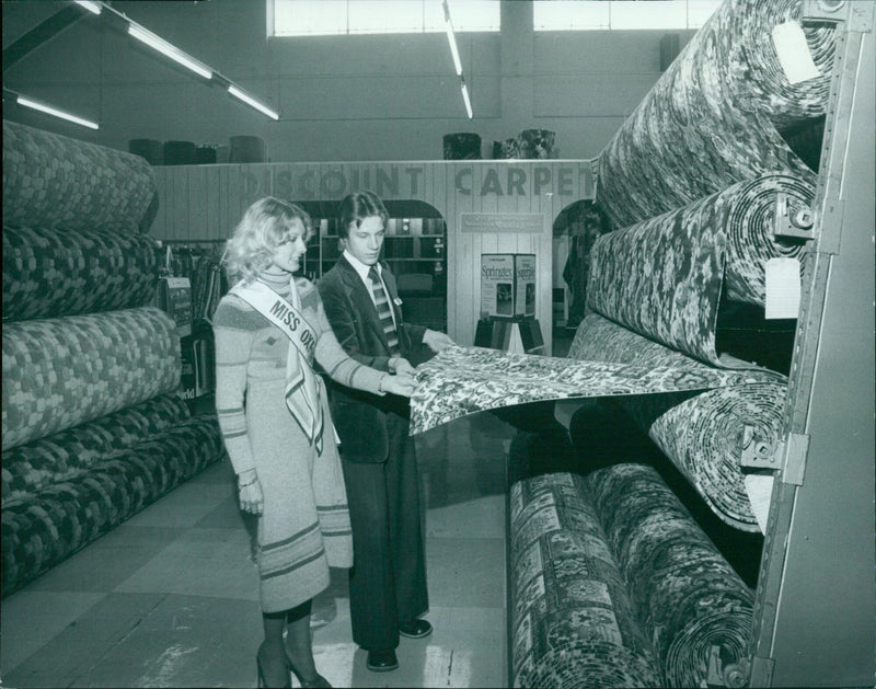 Customers find genuine bargains at Discount Carpets, thanks to the company's special relationship with MFI Carpets. - Vintage Photograph