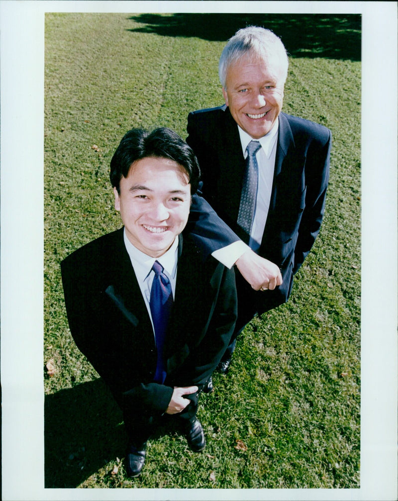 McCarthy & Stone Managing Director Steve Phillips and Land Manager Vinn Nguyen seeking disused properties. - Vintage Photograph