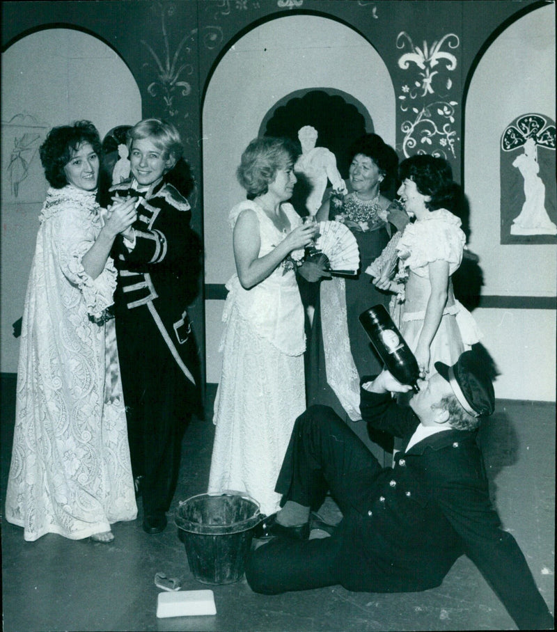 Cast members of the 1984 production of the operetta "Die Fledermaus" pose for a photograph. - Vintage Photograph