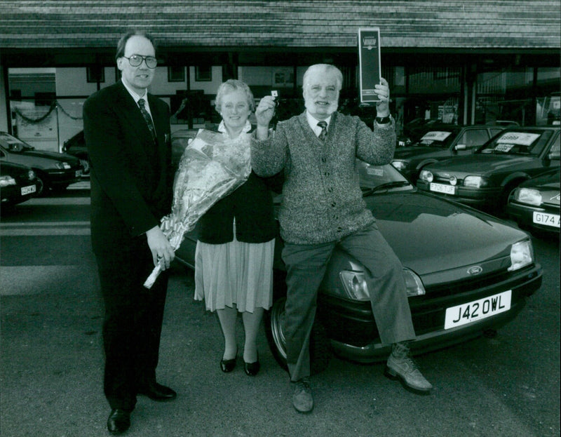 Alan Pierce and John Maddern of New Marston celebrate winning a car from Hartfords. - Vintage Photograph