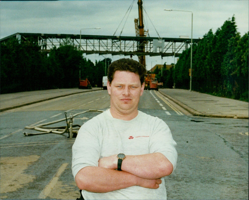 Louis Walsh, a fitter on the Cowley Bridge, Garsington Road, Oxford, overlooks his work. - Vintage Photograph