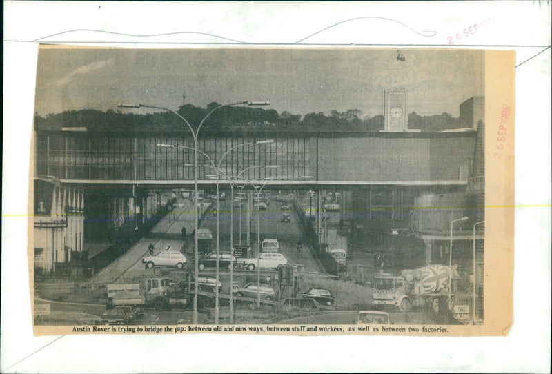 Austin Rover staff and workers bridge the gap between old and new. - Vintage Photograph