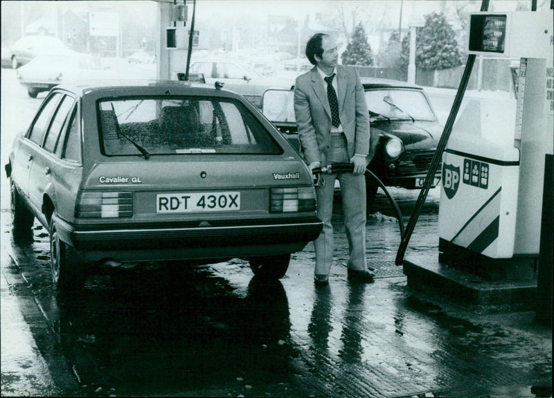 A Cavalier GL O RDT 430X Vauxhall car parked on a city street. - Vintage Photograph