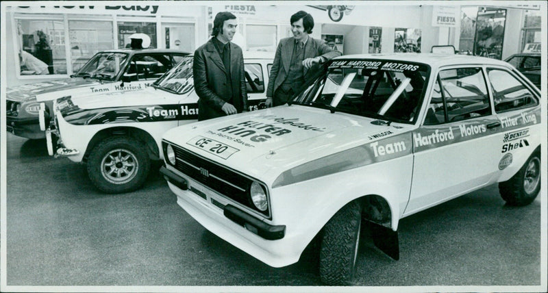 Charles Eveson and Bill Gwynne with the new car at Hartford Motors. - Vintage Photograph