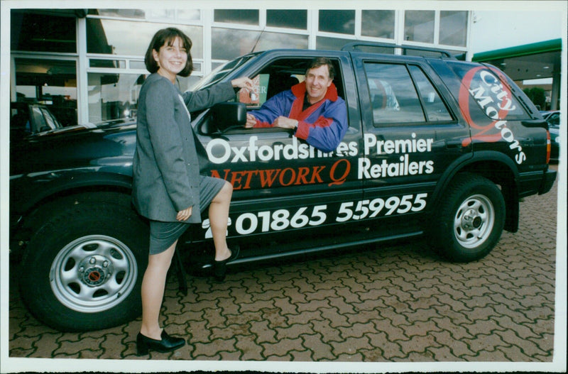 Leigh Webb receives the keys of his new car from City Motors. - Vintage Photograph