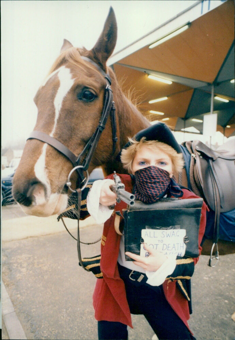 Highwaywoman Lindsey Crofts raises money for charity with a Dick Turpin-style hold-up. - Vintage Photograph