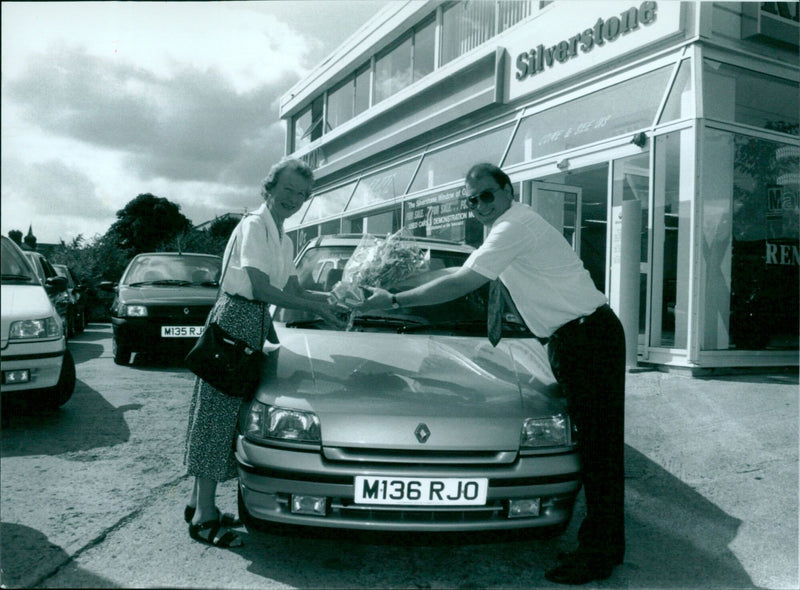 A demonstration of used cars at the Silverstone window in Alder ton, UK. - Vintage Photograph