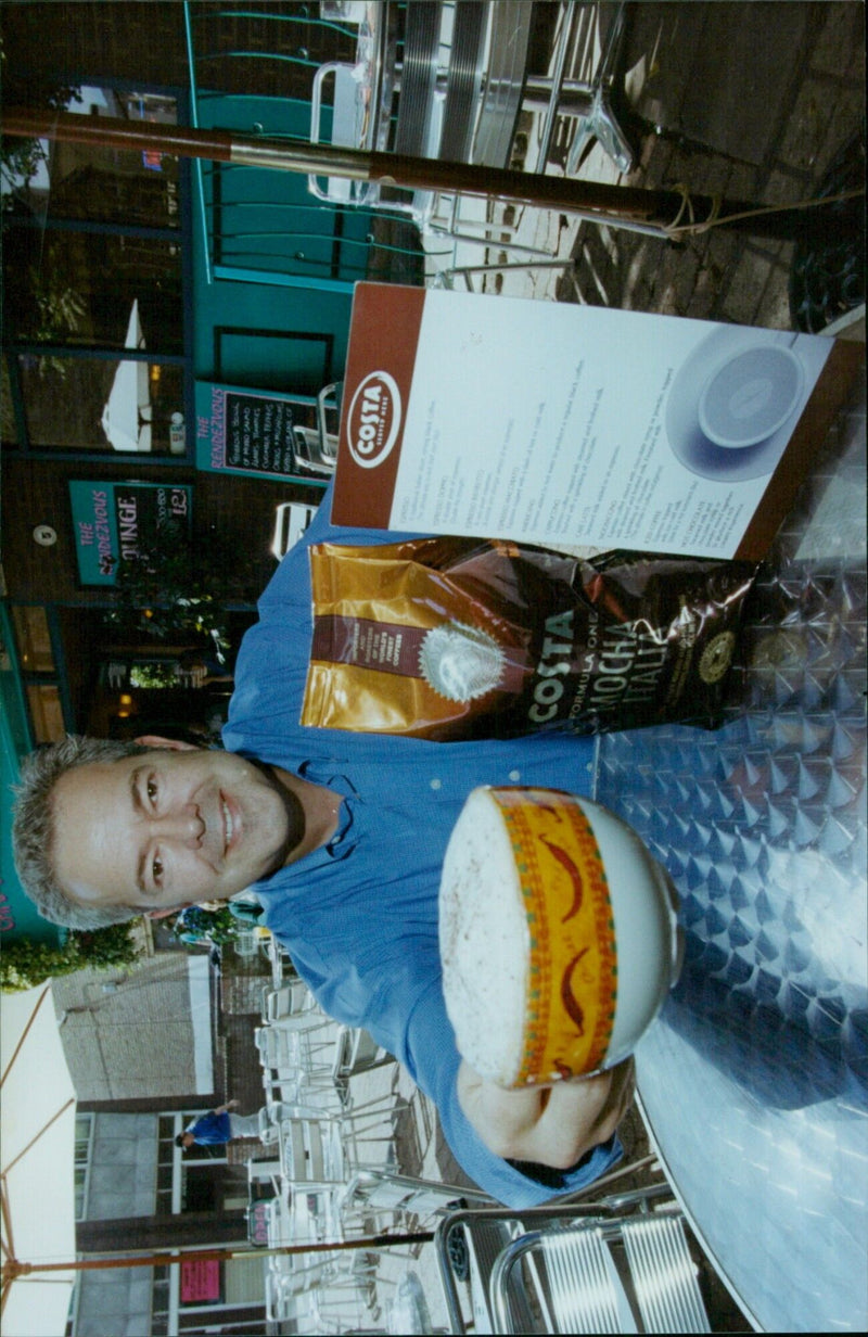 A line of coffees from Costa's Formula One Mocha Hali collection is served at The Rendezvous Yenerous Bowk of Muso in Witney, Oxfordshire. - Vintage Photograph