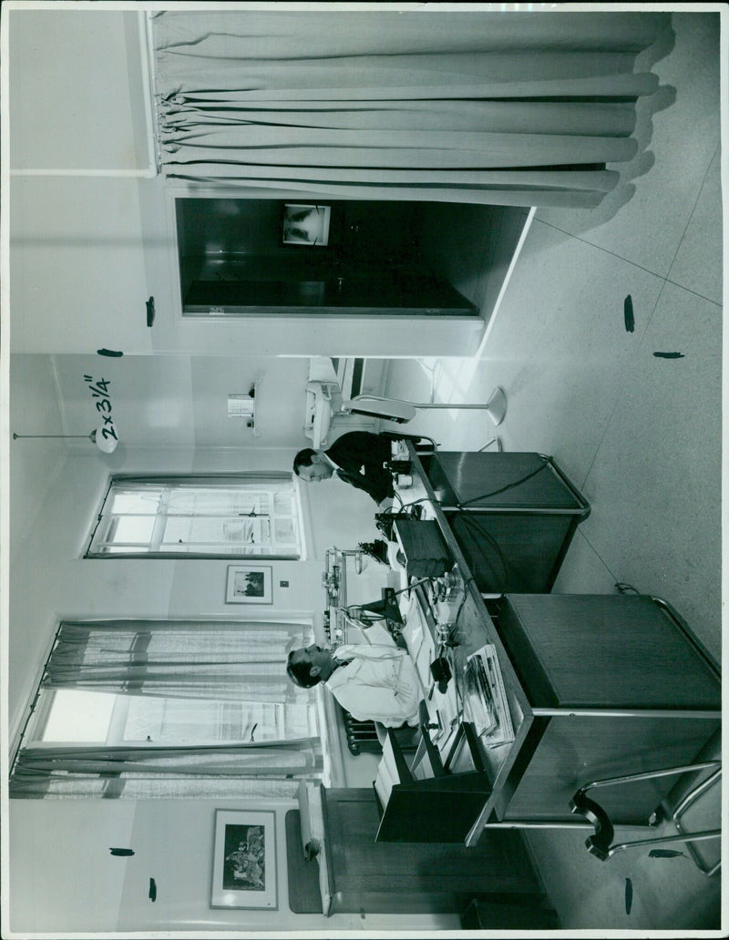 Two men in a telephone booth - Vintage Photograph