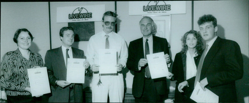 Members of the Young Ideas at Work program work together on a project. - Vintage Photograph