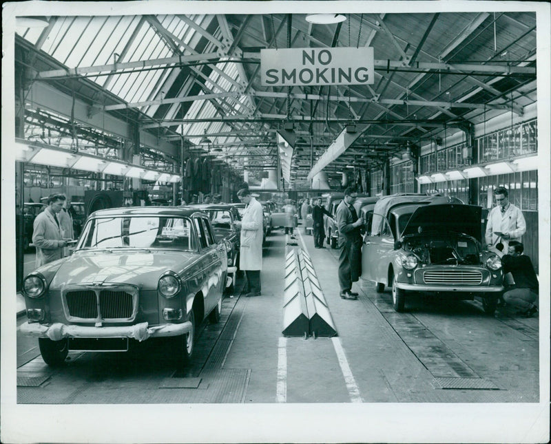 A production line at Monin Works B. M. C. in Cowley, England. - Vintage Photograph