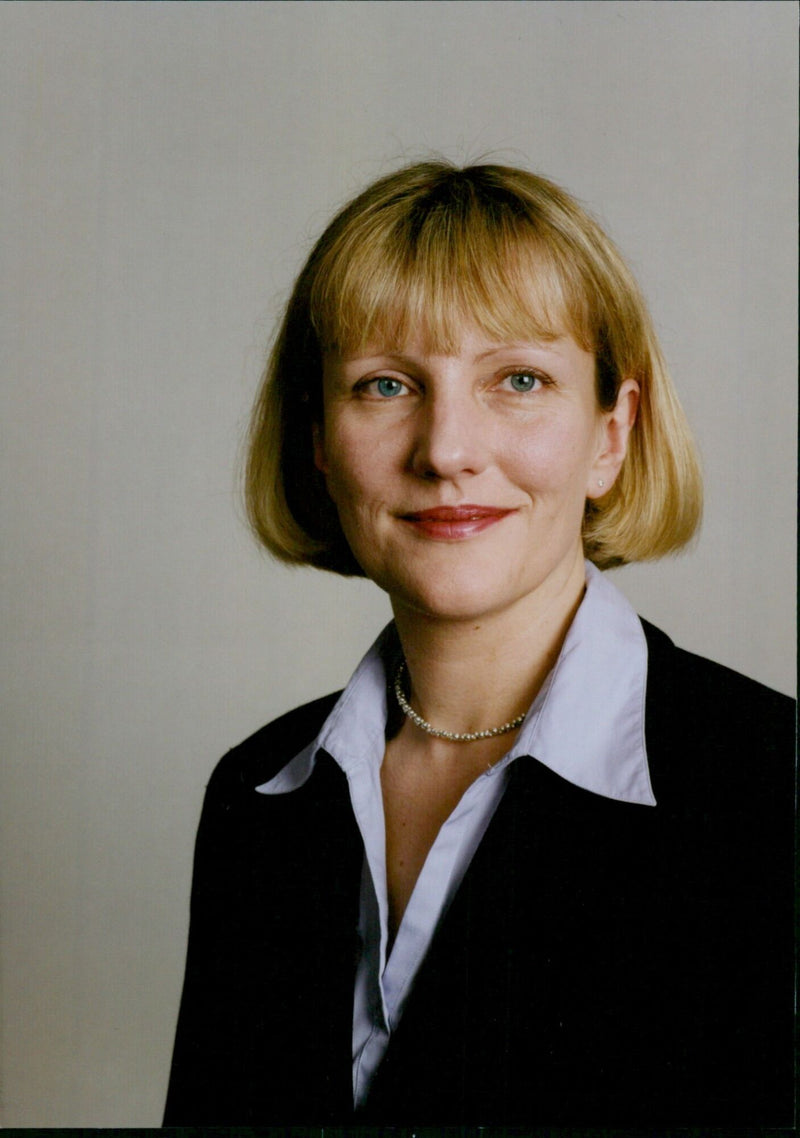 Solicitor Jacqueline Lawrence from Linnells law firm meets with a client. - Vintage Photograph