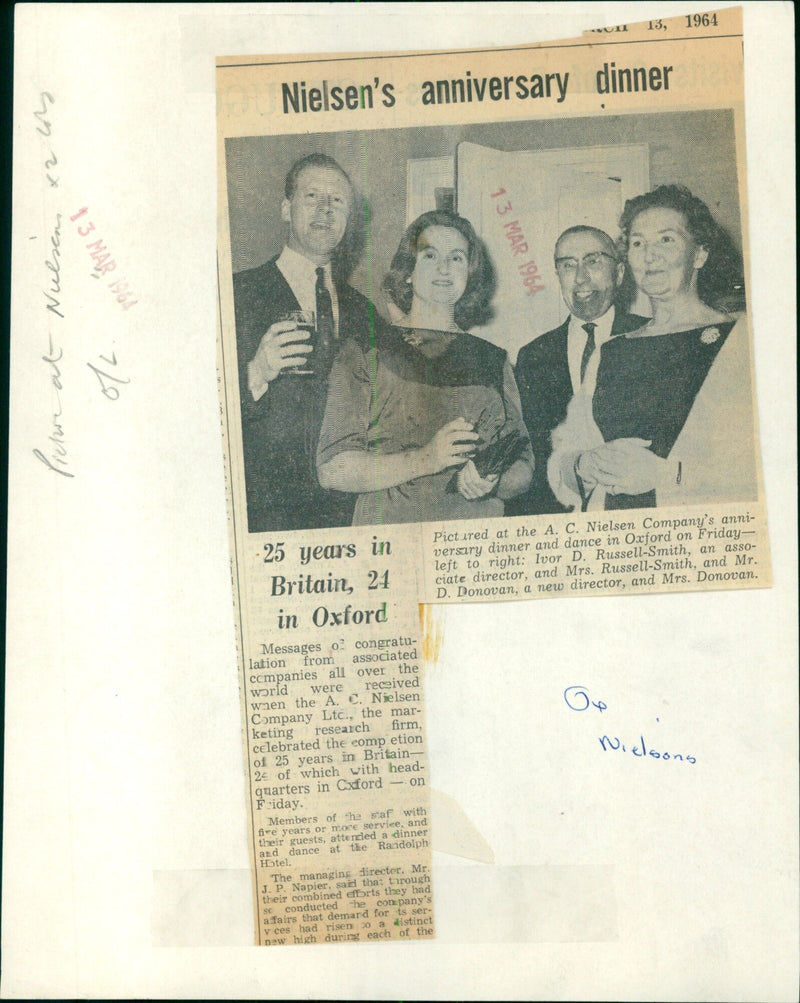 Members of the A. C. Nielsen Company staff and their guests celebrate 25 years in Britain and two in Oxford at a dinner and dance. - Vintage Photograph