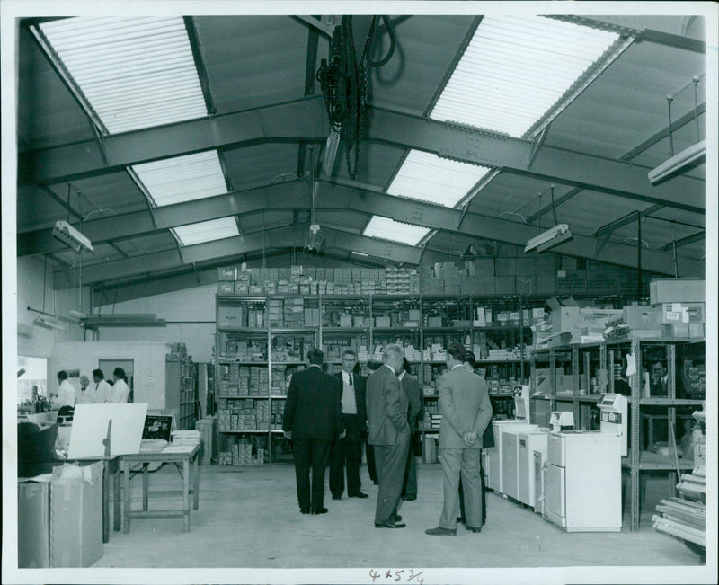 The interior of a new building is seen on a Special Page Friday. - Vintage Photograph