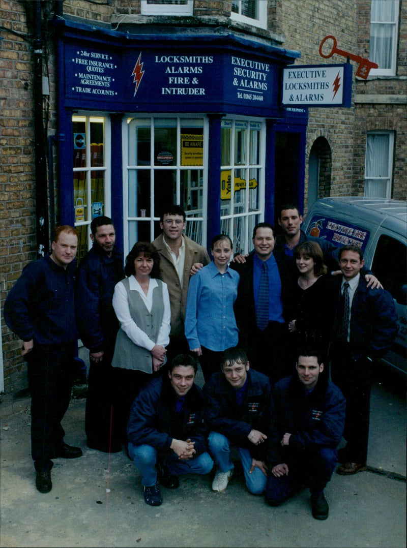 Staff of Executive Locksmiths and Alermo at their Iffley Road location in Oxford, England. - Vintage Photograph