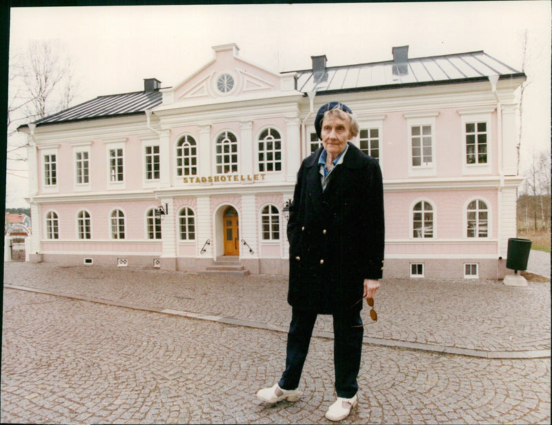 Astrid Lindgren stands outside the town of Vimmerby, which bears her name, in Stockholm, Sweden on May 6, 2020. Photo: Anders Holmström / PICA PHOTO - Vintage Photograph