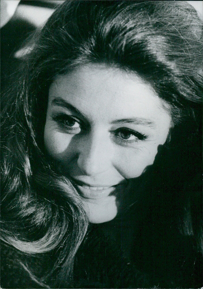 French film actress Anouk Aimee poses for a portrait in 1969. - Vintage Photograph