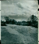 Firefighters battle a blaze at a warehouse in the city. - Vintage Photograph