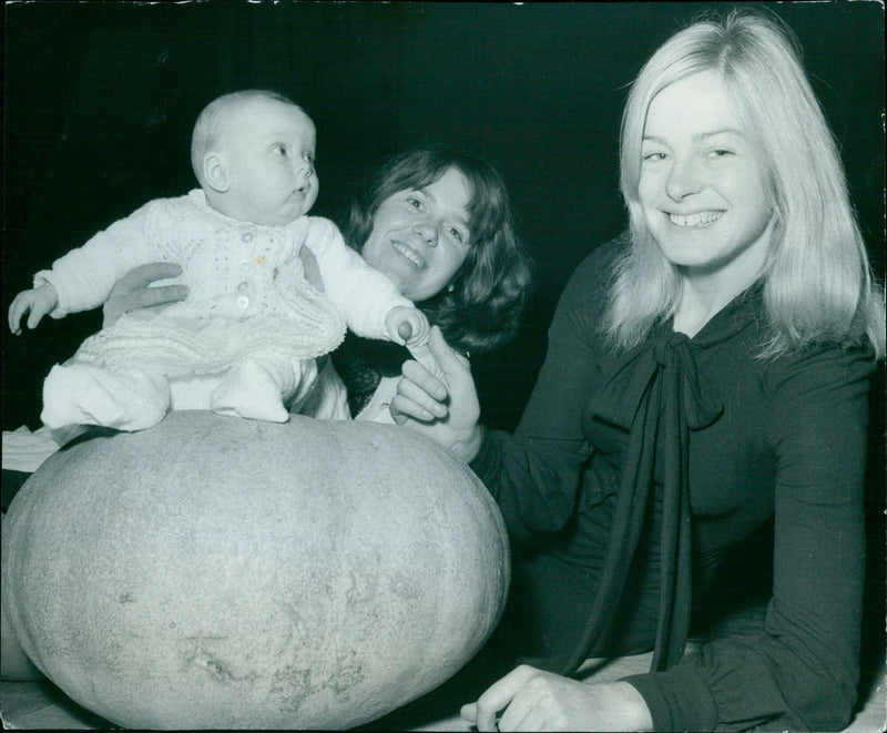 Mrs Susan Dawson presents a 56-pound pumpkin to Cinderella at Oxford's Playhouse. - Vintage Photograph