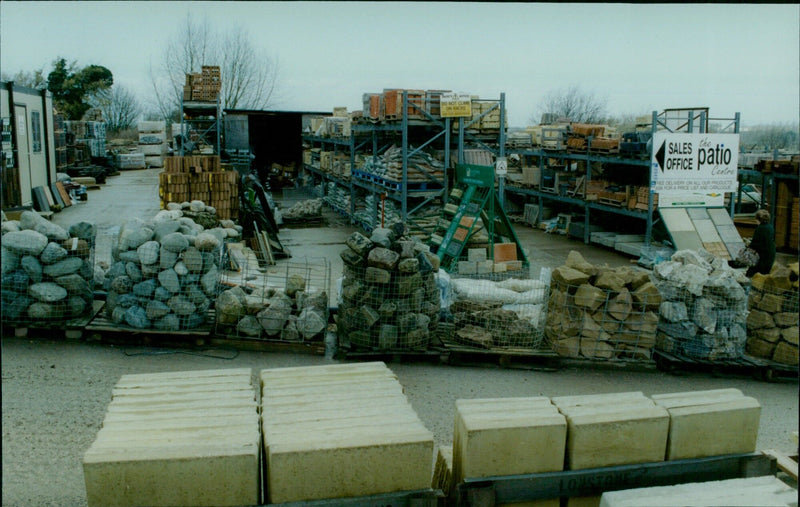 Employees and customers at Patio Centre in Oxford, England, browse shelves of building supplies. - Vintage Photograph