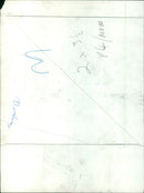 A man rides a bicycle along a canal in Berlin, Germany. - Vintage Photograph