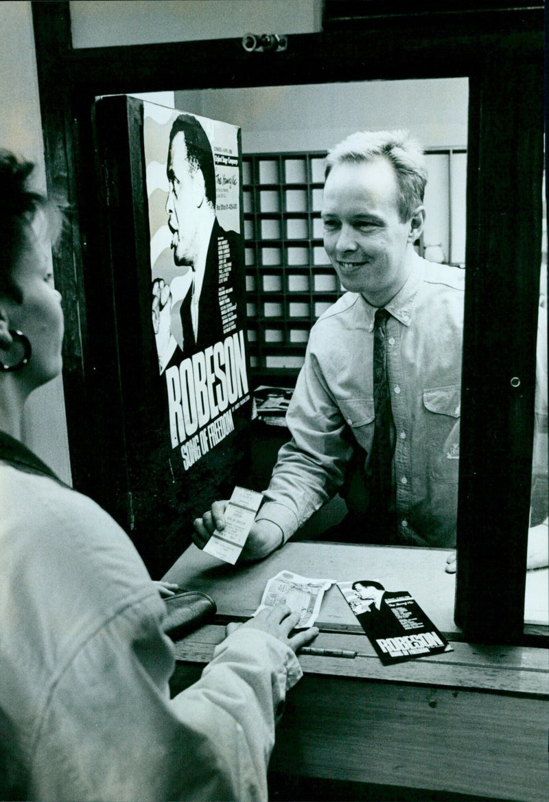 Oxford Playhouse Box Office Assistant Terry Hawkins talking to a customer. - Vintage Photograph