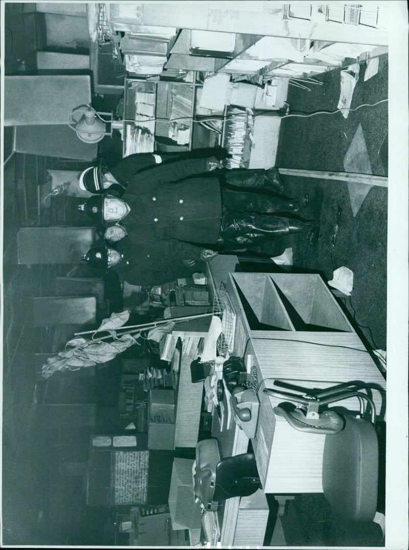 Firefighters assess the damage from a fire at Pergamon Press. - Vintage Photograph