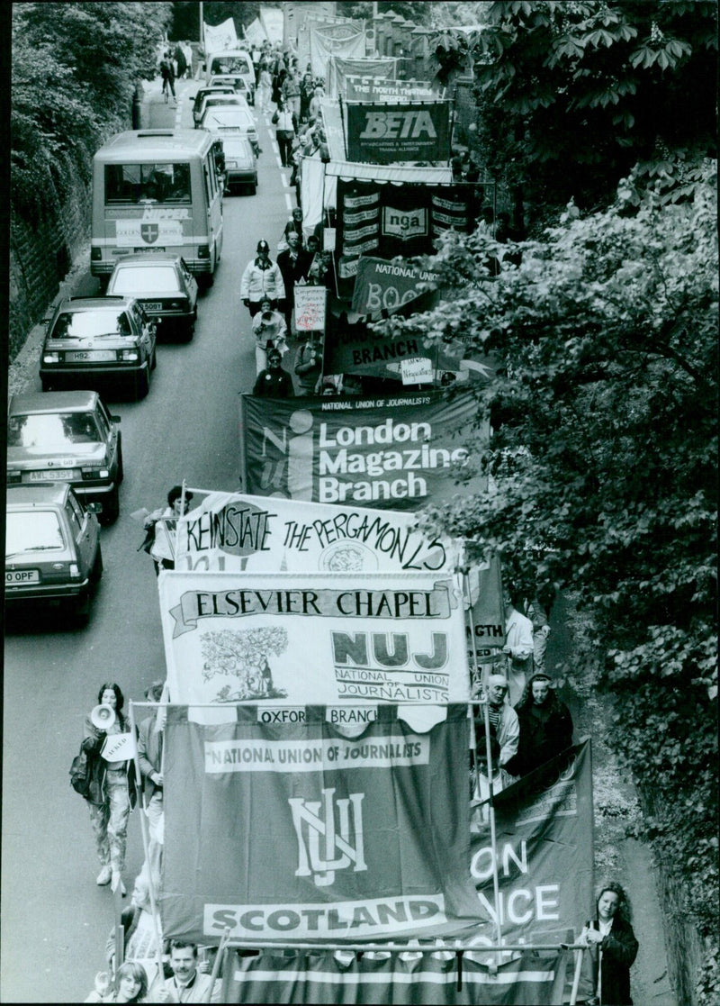 Striking workers from the Pergamon march down Headington Hill in Oxford, England. - Vintage Photograph