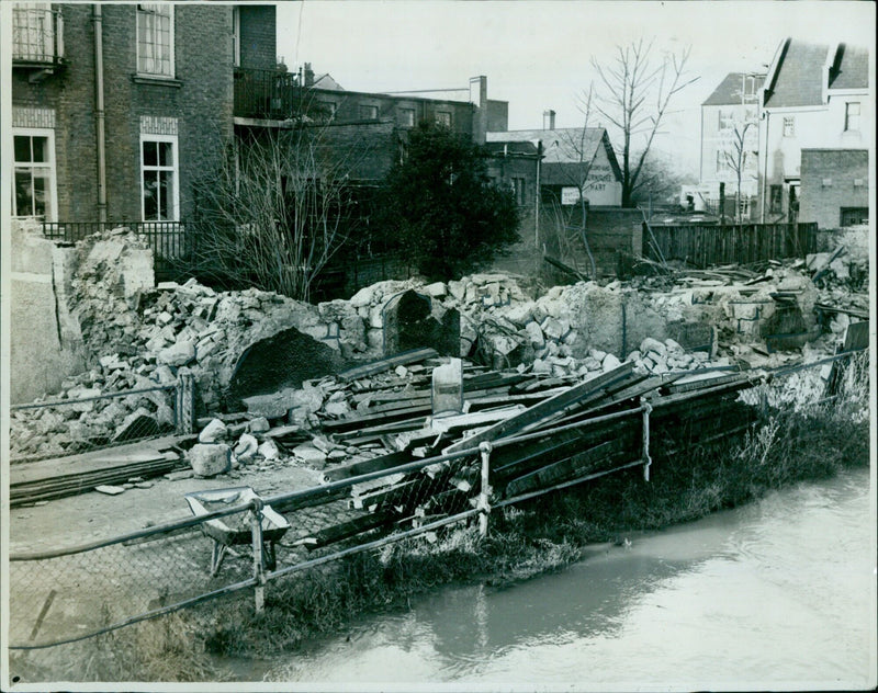 Demolition of Oxford's Pra Urniture Mart begins. - Vintage Photograph