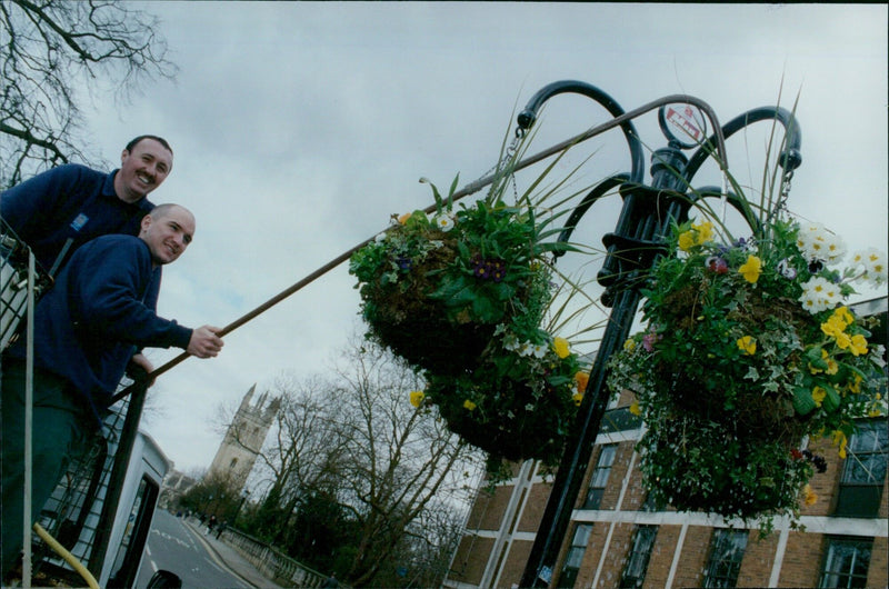 Oxford City Council hangs hanging baskets at The Plain. - Vintage Photograph