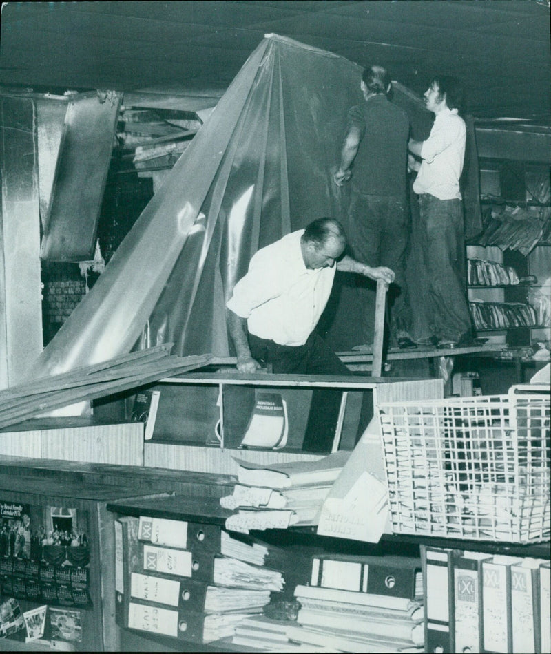 Firefighters assessing damage in a gutted area. - Vintage Photograph