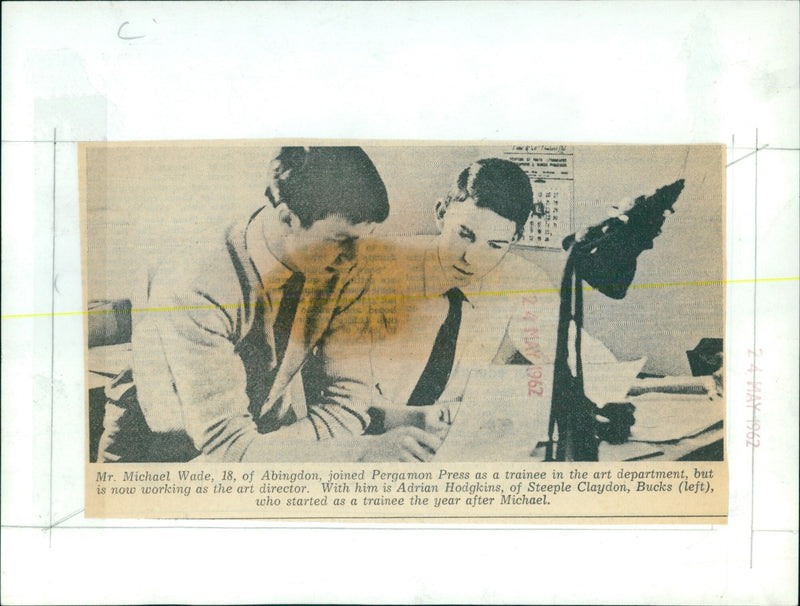 Michael Wade (right) and Adrian Hodgkins (left) pose for a photo after Wade was promoted to art director at Pergamon Press. - Vintage Photograph