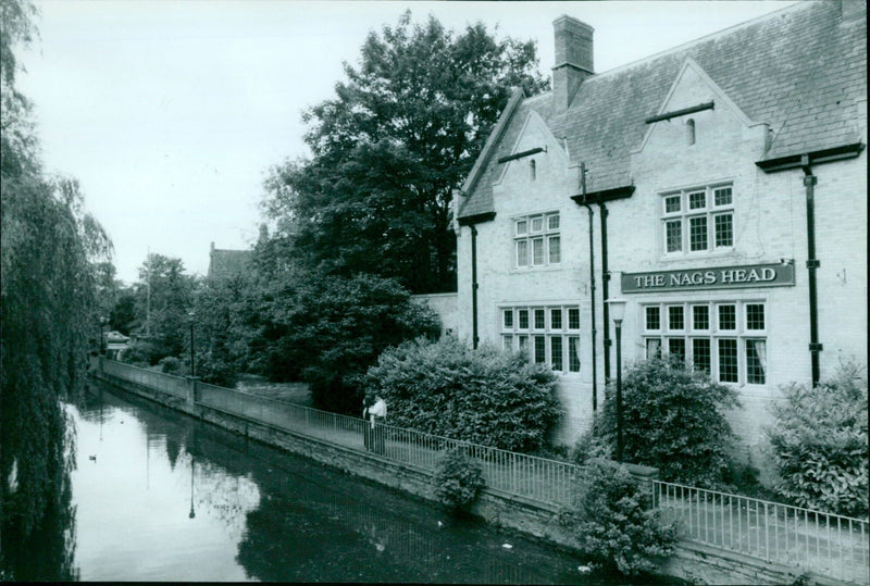 A comparison of The Nags Head pub in 1988 and 2020. - Vintage Photograph