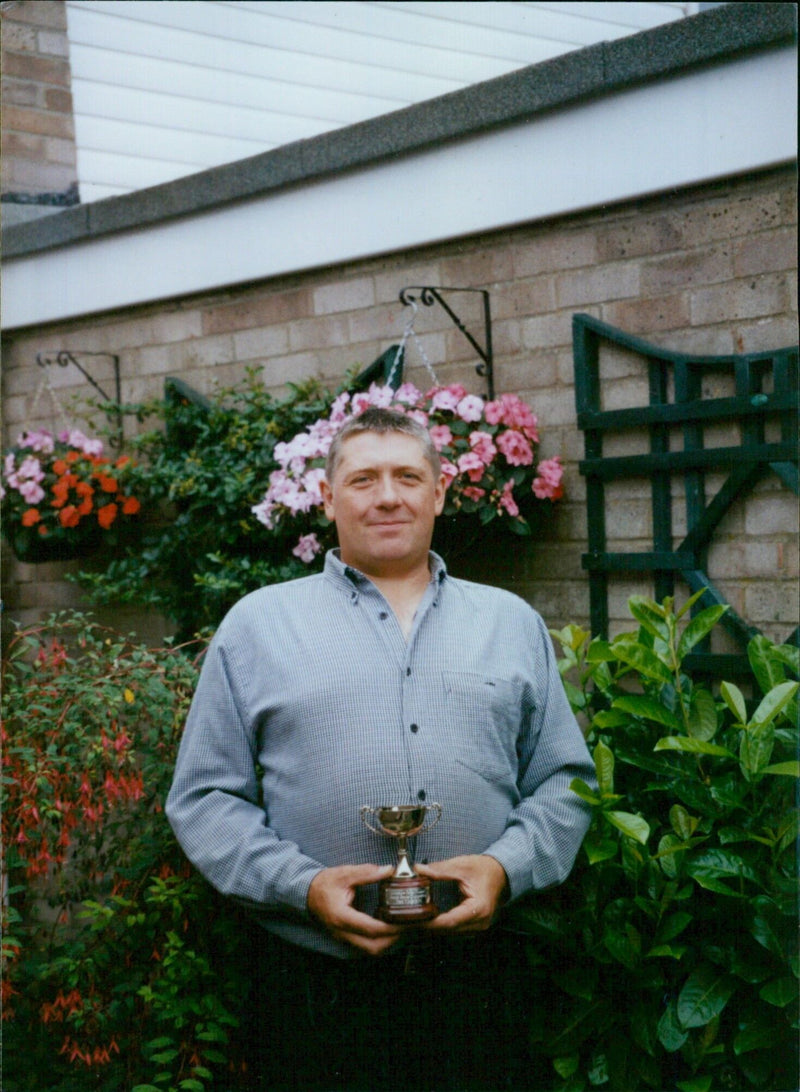 Chis Boswell receives the Best Front Gooder award at Ox Flowers. - Vintage Photograph