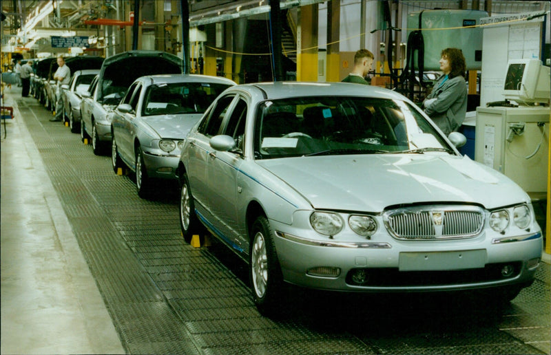 Executives and politicians gather to celebrate the opening of the new Rover 75 plant in Cowley, UK. - Vintage Photograph