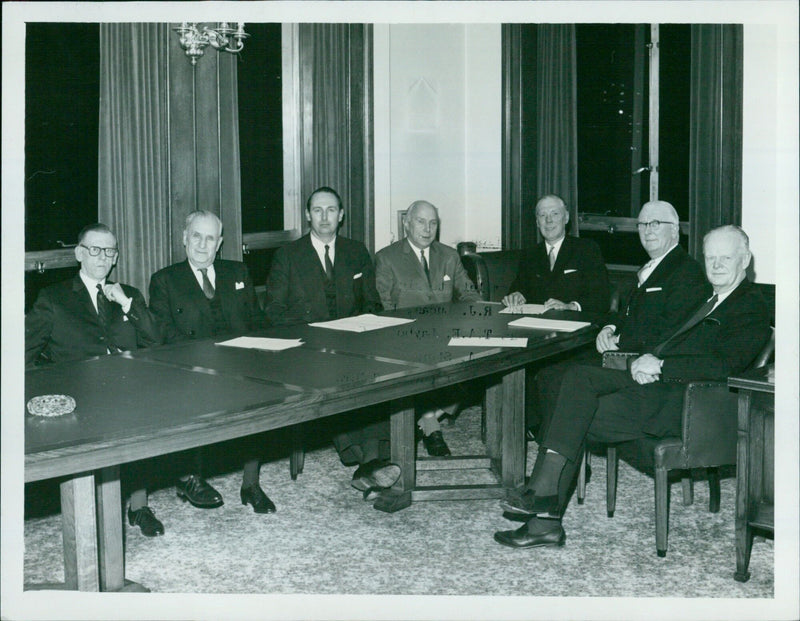 Members of the Board of British Motor Holdings Limited pose for a photograph. - Vintage Photograph