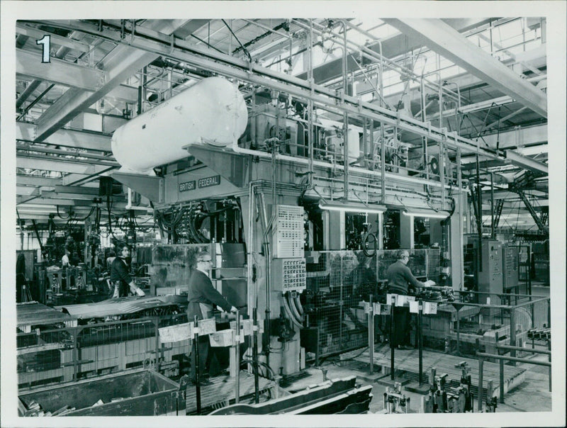 A new four-post mechanical welding press developed specifically for the automotive industry. - Vintage Photograph