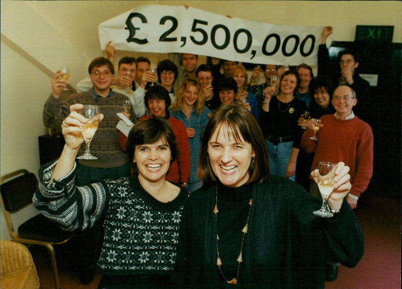 Joint Directors of the Oxford Drama Playhouse, Tish Francis and Hedda Beeby, celebrate with staff after receiving £2,500,000 in lottery funding on November 20th, 2020. - Vintage Photograph