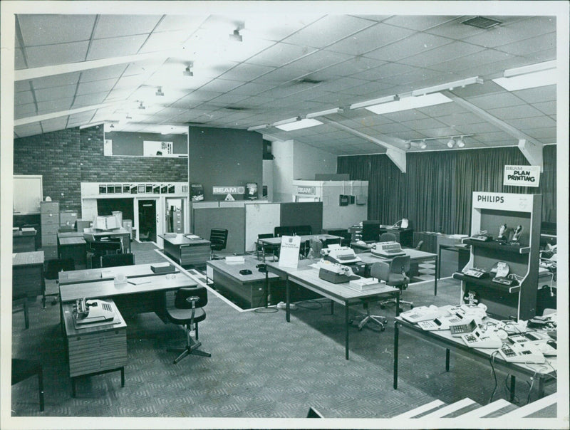 Businesspeople discussing a Beam Beam Beam Arra Philips Beam Plan Printing contract. - Vintage Photograph